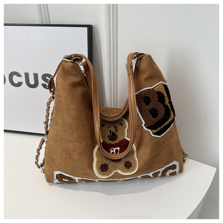 Shoulder bag in playful bear pattern Bowlift