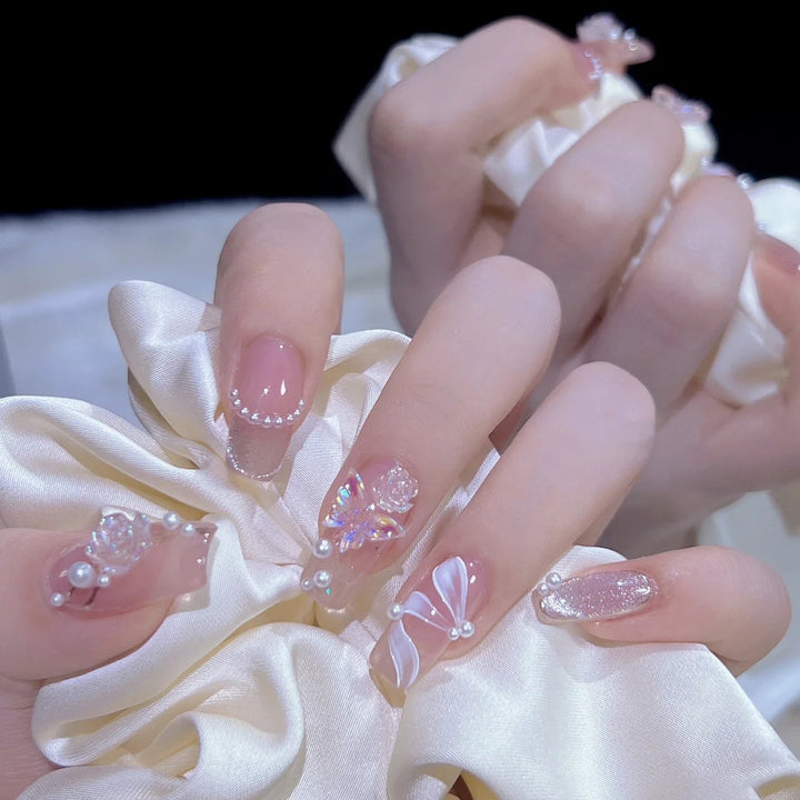 Artificial artificial nails with heart design and glitter elements Bowlift