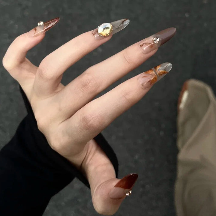 Artificial nails with elegant 3D details and sparkling accents Bowlift