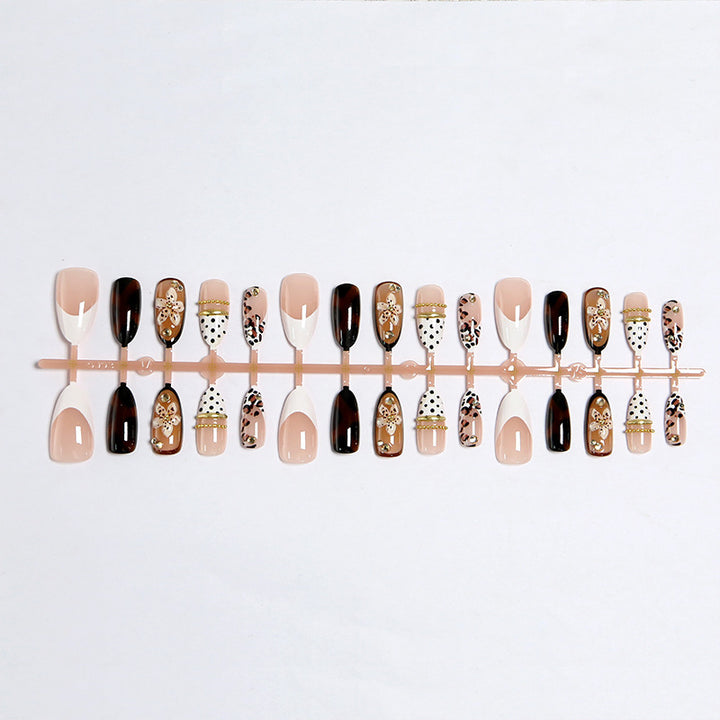 Exquisite nail art with elegant embellishments Bowlift
