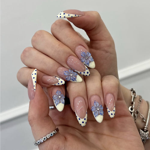 Artful stiletto nails with floral design Bowlift