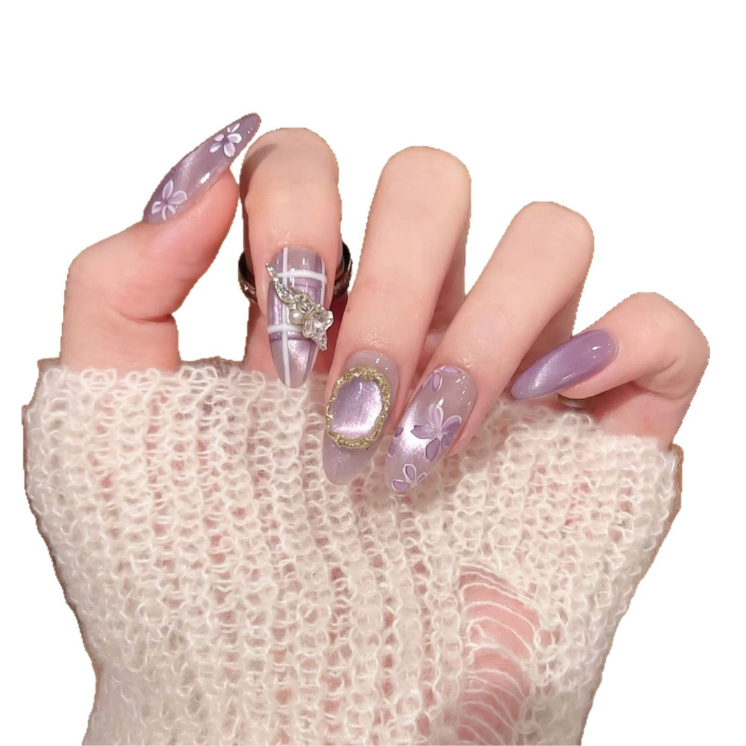 Artistic Press-On Nail Set with Floral Accents Bowlift