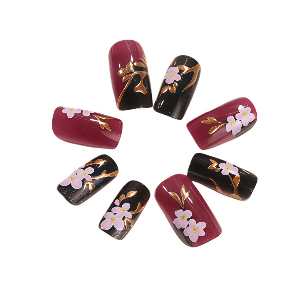 Artificial nails with elegant floral accents Bowlift