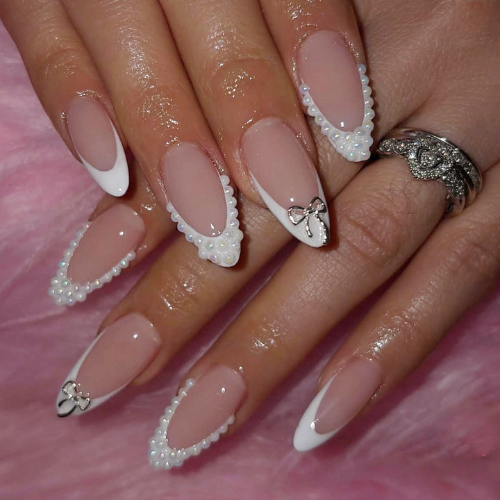 Elegant Pearl-Accentuated Stiletto Nail Art Bowlift
