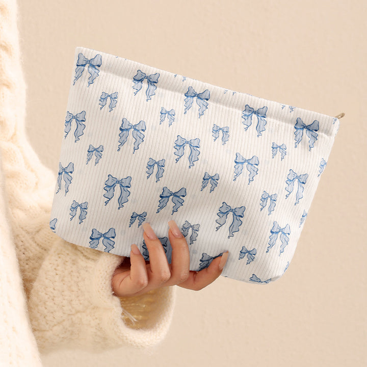 Playful Bow-Patterned Makeup Pouch Bowlift