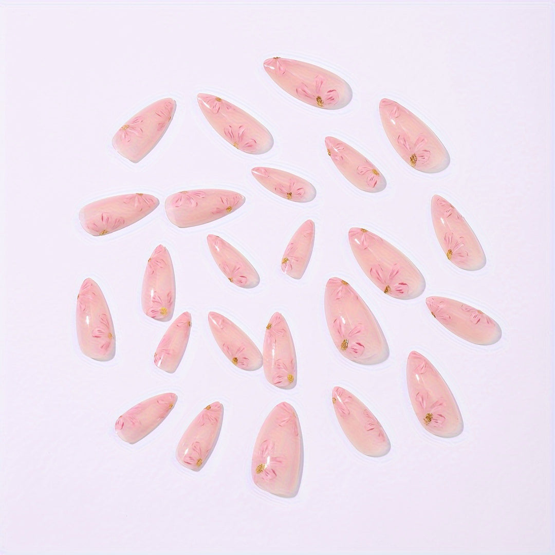 Artificial nail set with floral accents and gold embellishments Bowlift