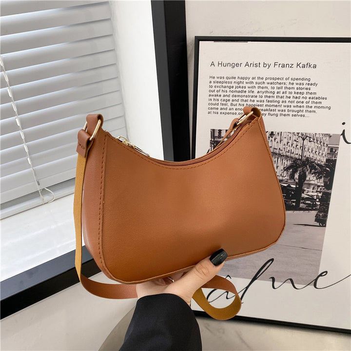 Elegant Handbag in Curved Design Bowlift