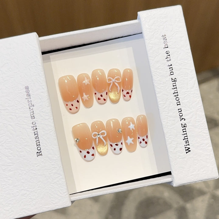Artificial nails with decadent design and romantic accents Bowlift