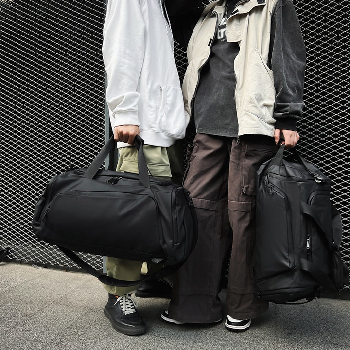 Sporty travel bag with many compartments Bowlift