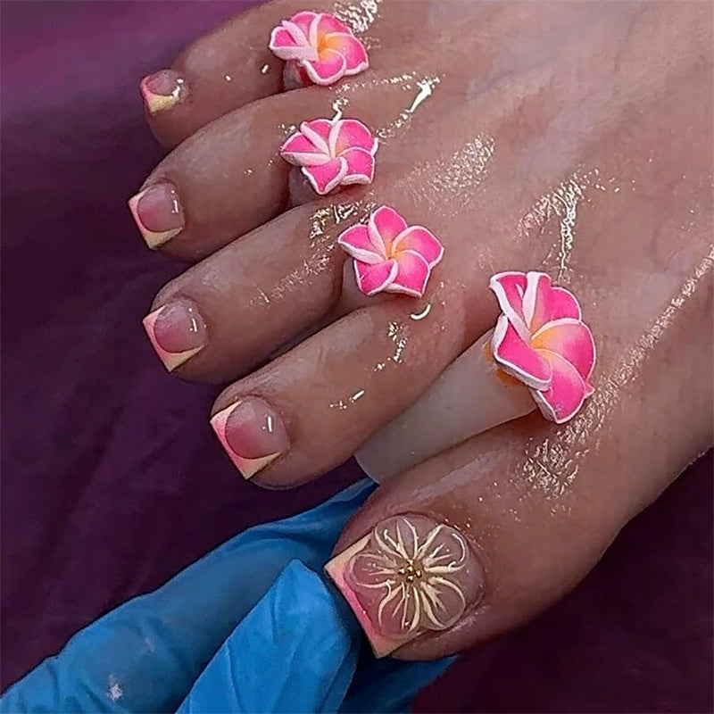 Artful toenail decoration with elegant gold accent Bowlift