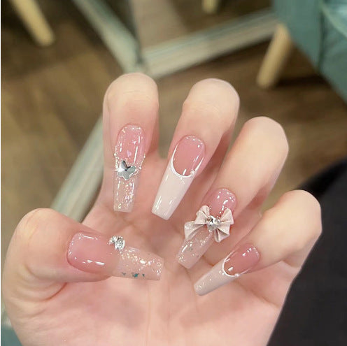 Artificial nails in creative moon and star design Bowlift