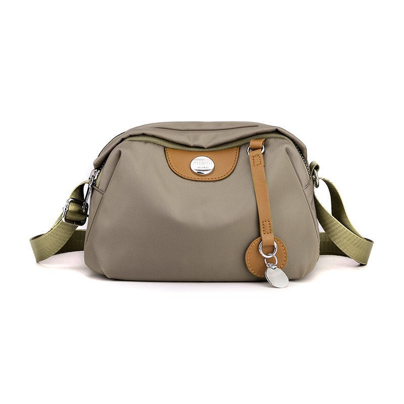 Shoulder bag with adjustable shoulder strap and clear compartment system Bowlift