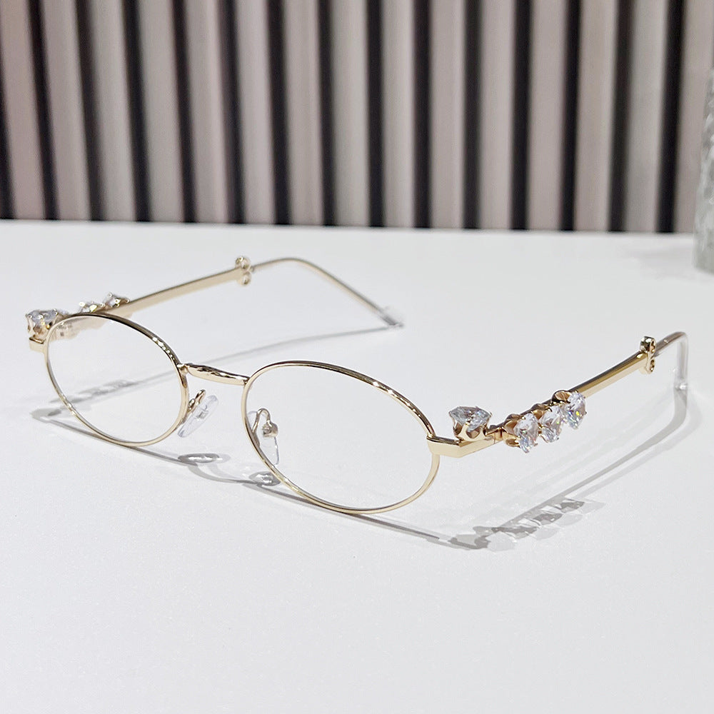 Fashion-Forward Oval Sunglasses with Crystal Accents Bowlift