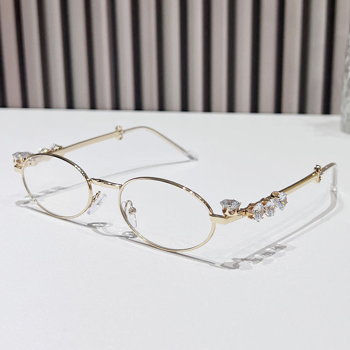 Fashion-Forward Oval Sunglasses with Crystal Accents Bowlift