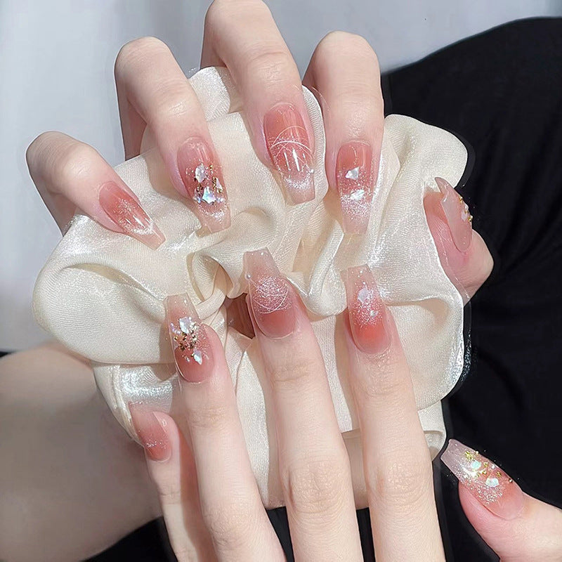 Artificial nail set with elegant glitter and flower decorations Bowlift
