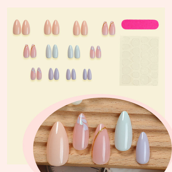 Artistic Press-On Nail Set with Gold Accent Designs Bowlift