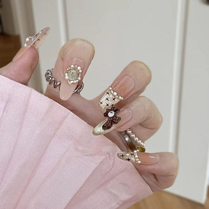 Artistic Stiletto Press-On Nail Set with Floral Embellishments Bowlift