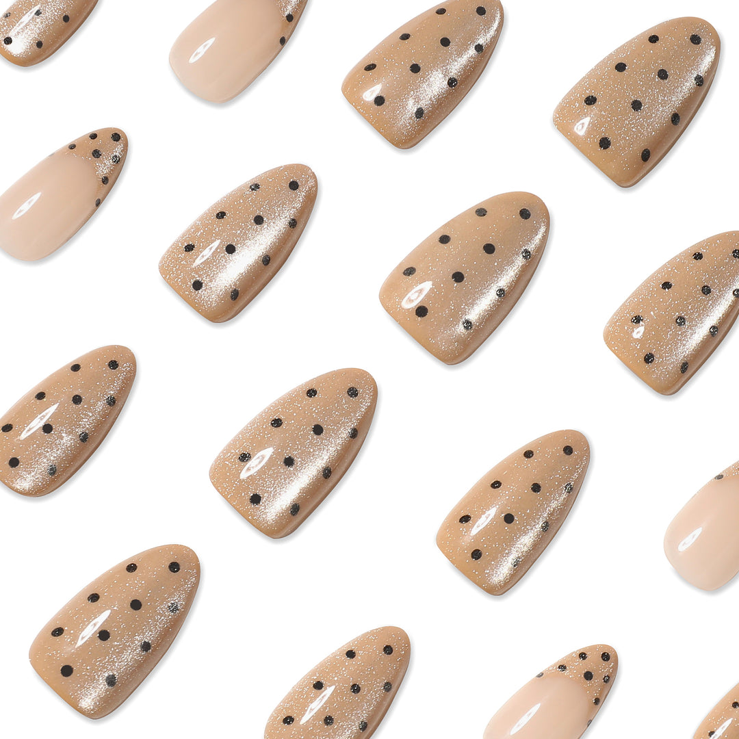 Elegant stiletto nails with glitter and dot design Bowlift