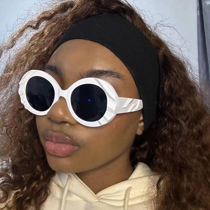 Women's sunglasses with unique, textured frame and protective lenses Bowlift