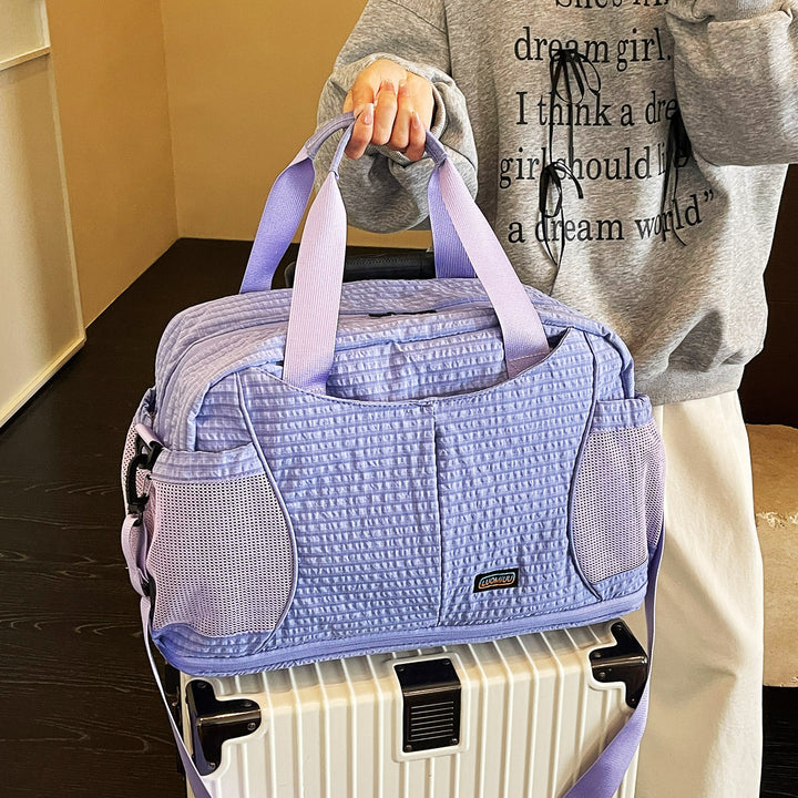 Textured Sports Duffle Bowlift