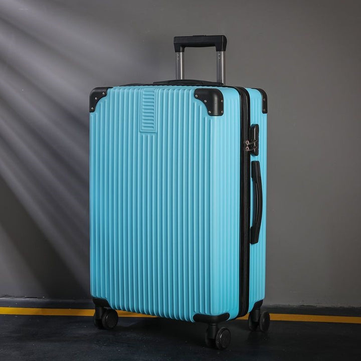 Hard shell suitcase with 360-degree wheel system and integrated safety feature Bowlift