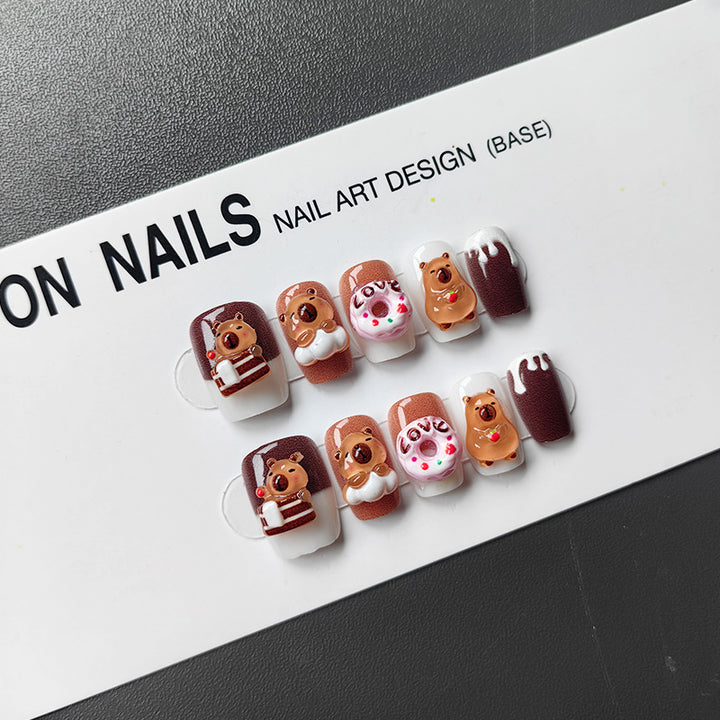 Playful art fake nails with animal motifs Bowlift