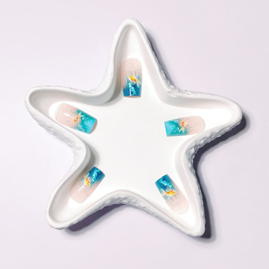 Creative art nails with maritime goldfish design Bowlift