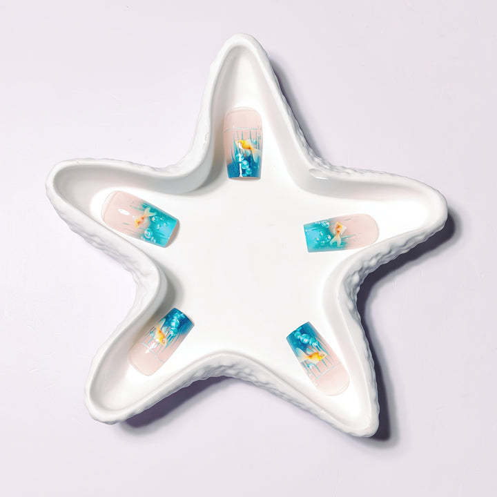 Creative art nails with maritime goldfish design Bowlift