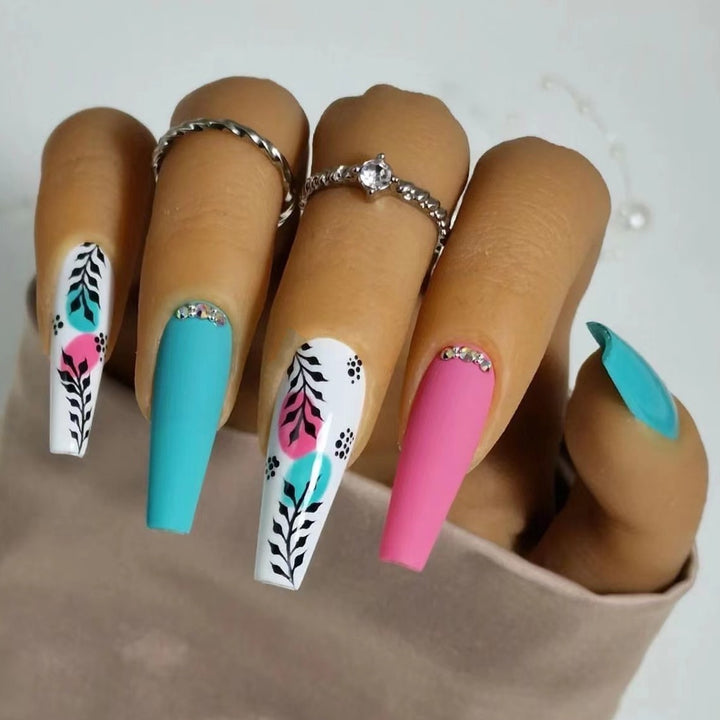 Artificial nails with floral design and creative accents Bowlift
