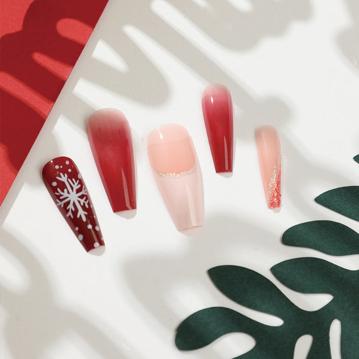 Artful Christmas nail extensions with elegant glitter and snowflake design Bowlift