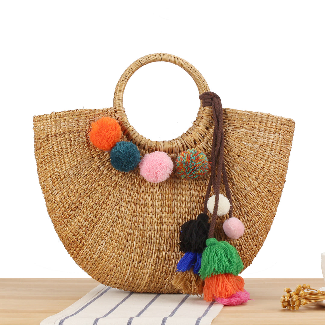 Straw handbag with colorful tassels and pom poms Bowlift