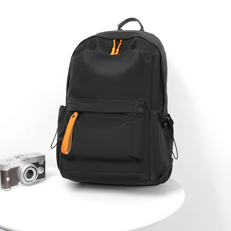 High-functional backpack with multiple compartments and ergonomic carrying elements Bowlift