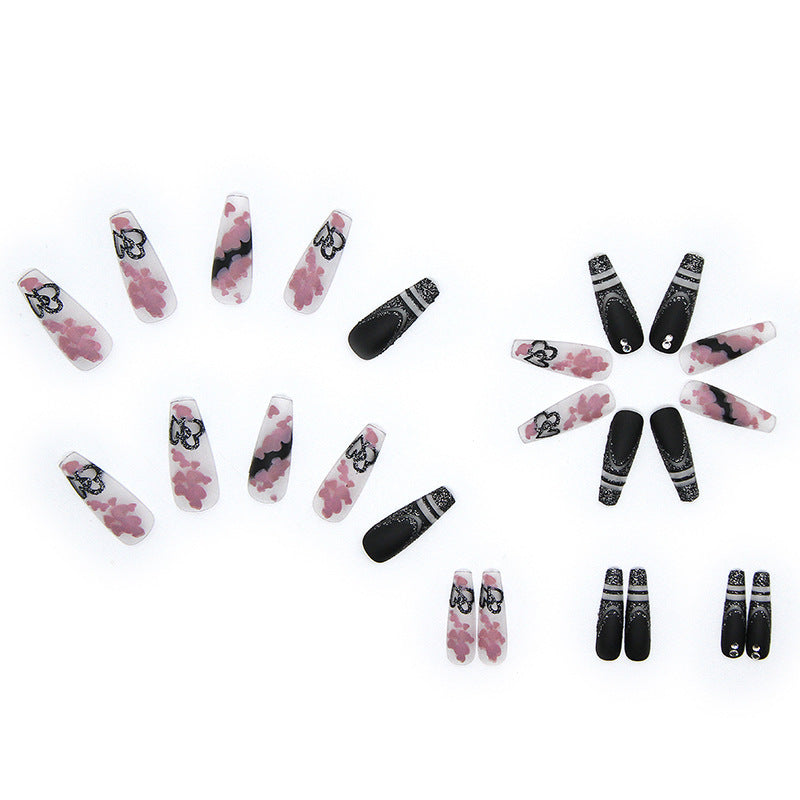 Artificial nail set with creative 3D elements and sparkling accents Bowlift