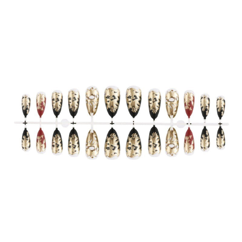 Elegant artificial nails with gold and black pattern Bowlift