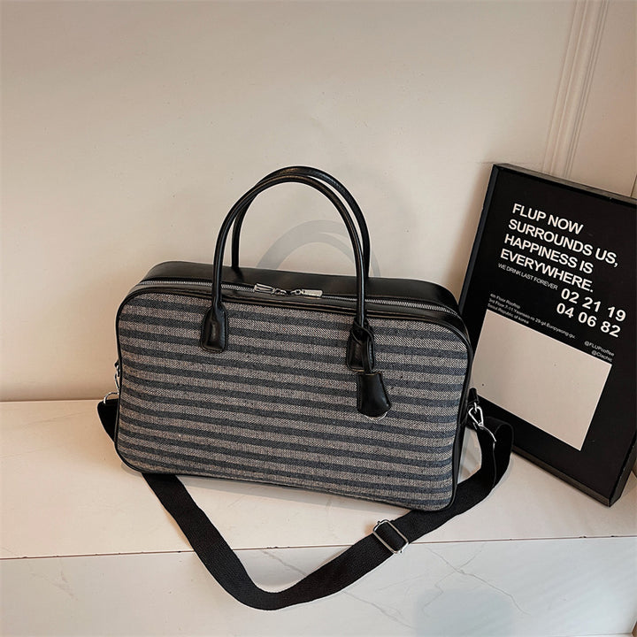 Elegant and Spacious Travel Bag Made of Faux Leather Bowlift