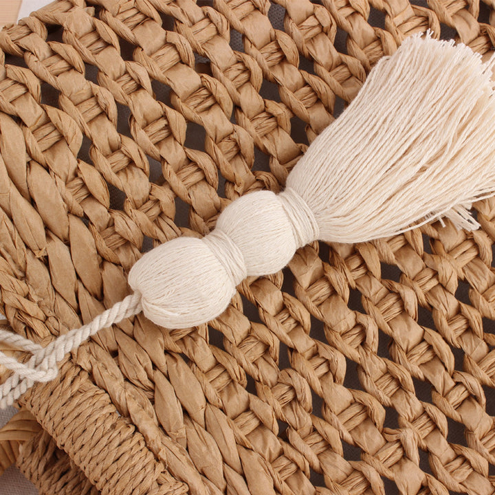 Basket bag with decorative tassel embellishment Bowlift