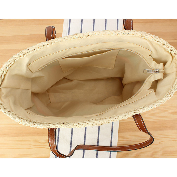 Beautiful braided straw bag with leather handles Bowlift