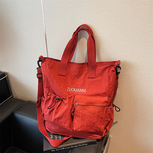 Tote bag with multifunctional outer pockets and adjustable shoulder strap Bowlift