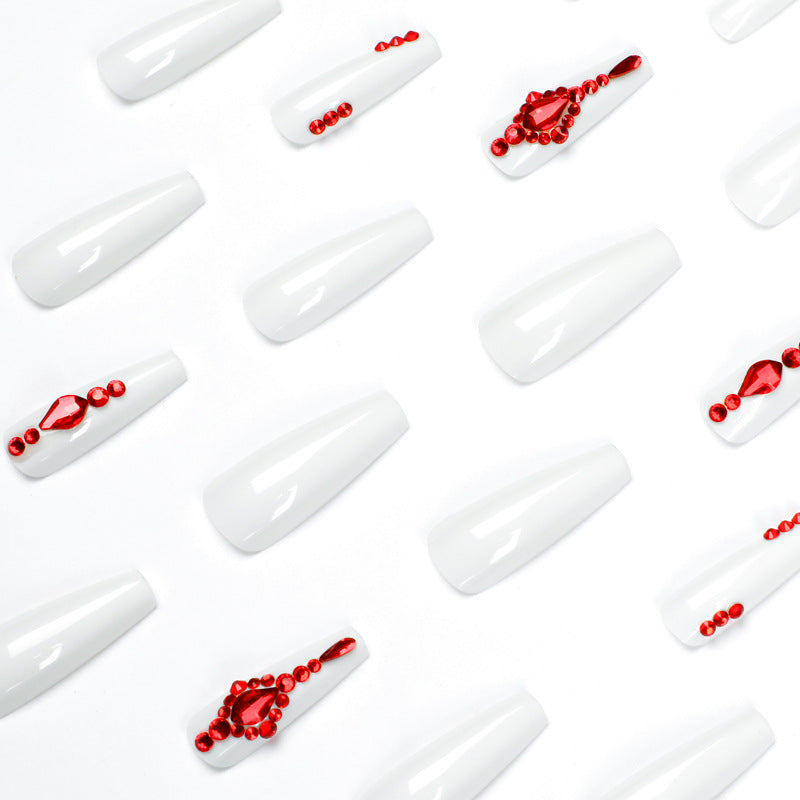 Artful nail extensions with glitter accents and elegant embellishments Bowlift