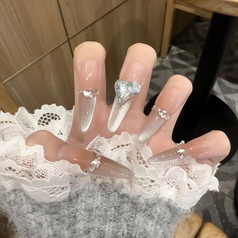 Glamorous artificial nail tips with elegant decorations Bowlift