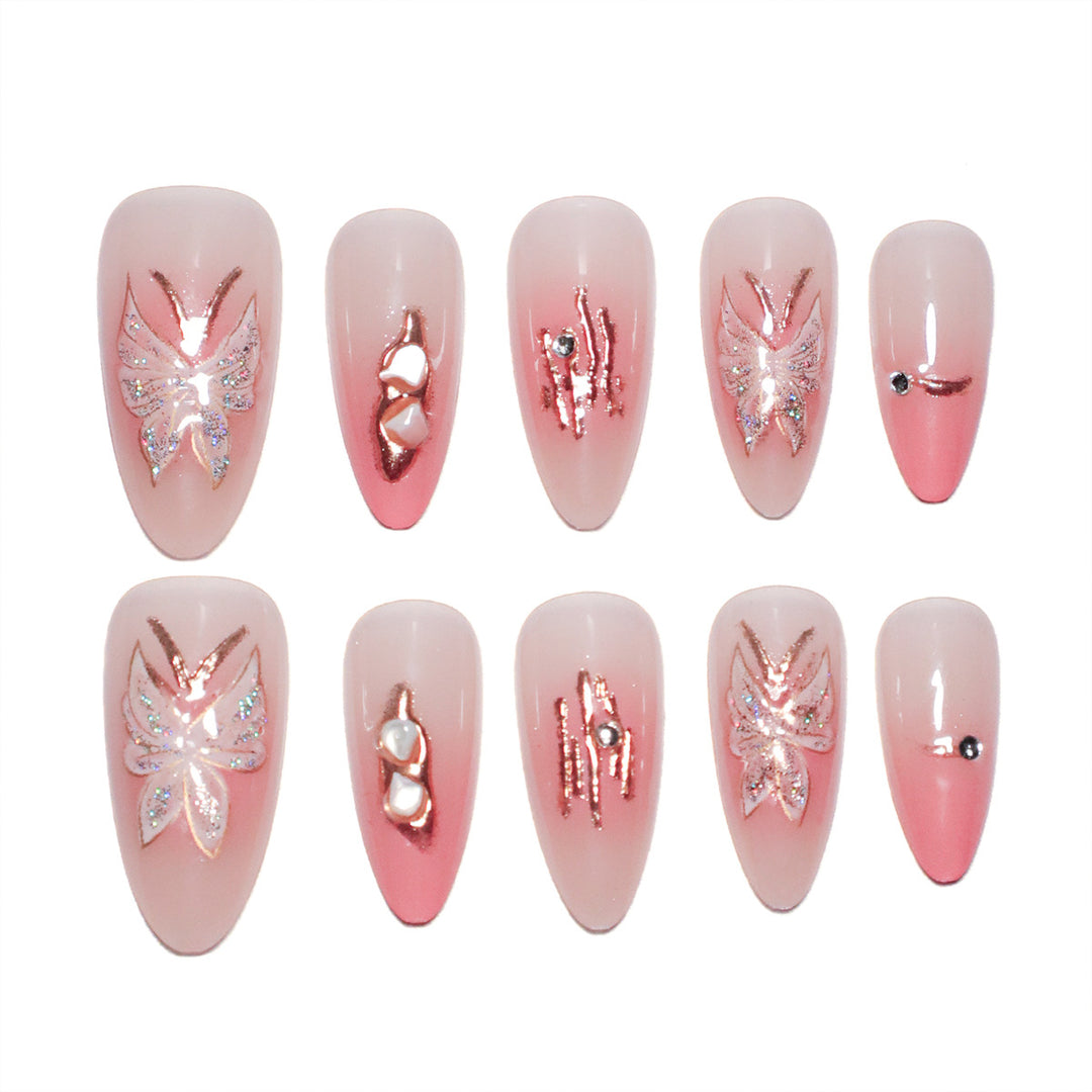 Artificial nail extensions with floral motifs and glitter accents Bowlift