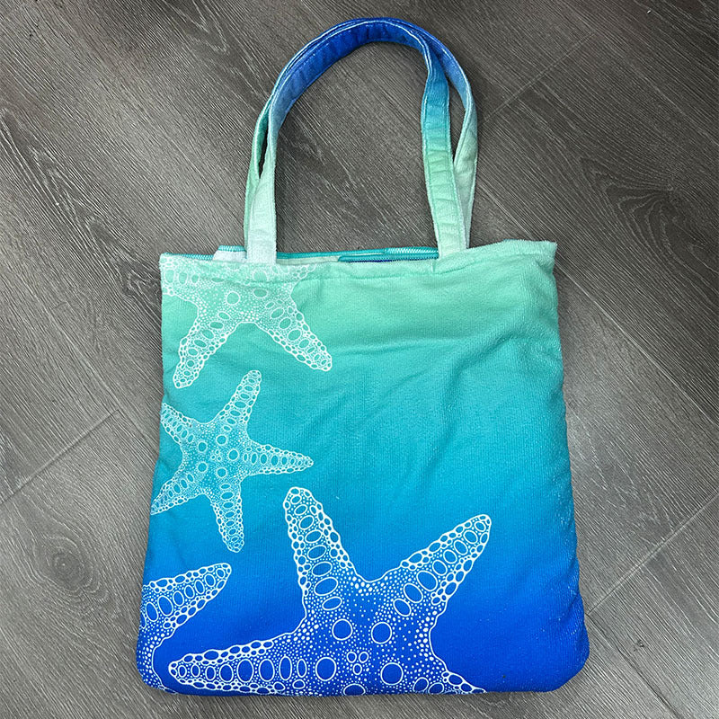Beach towel with elegant floral patterns Bowlift