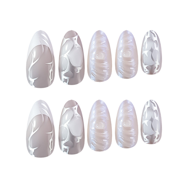 Elegant Stiletto Nail Extensions with Decorative Silver Accents Bowlift