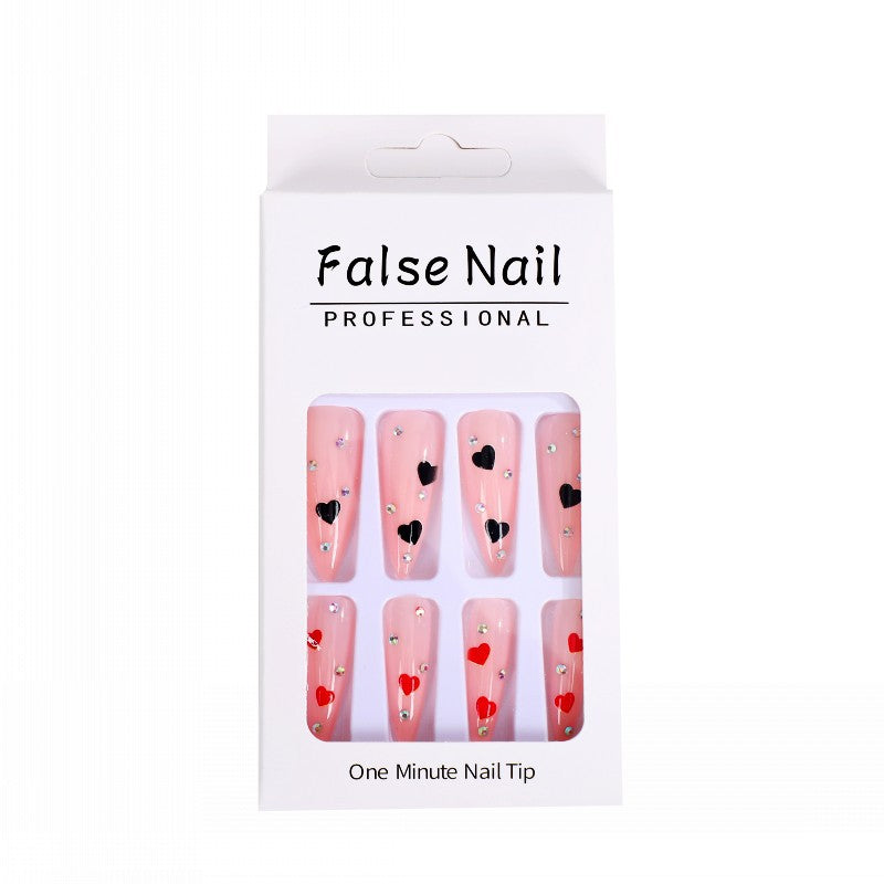 Glamorous artificial nails with heart accents Bowlift