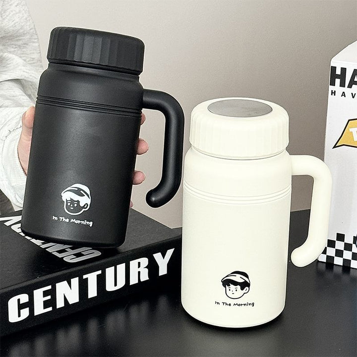 Women’s insulated carafe with ergonomic carrying handle and innovative closure system Bowlift