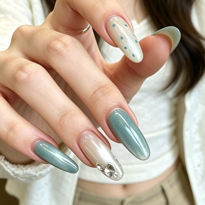 Artistic Press-On Nail Design with 3D Accents Bowlift