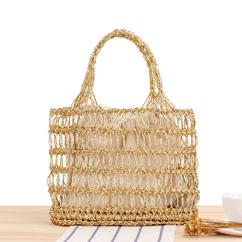Shoulder bag made of punched metal grid Bowlift