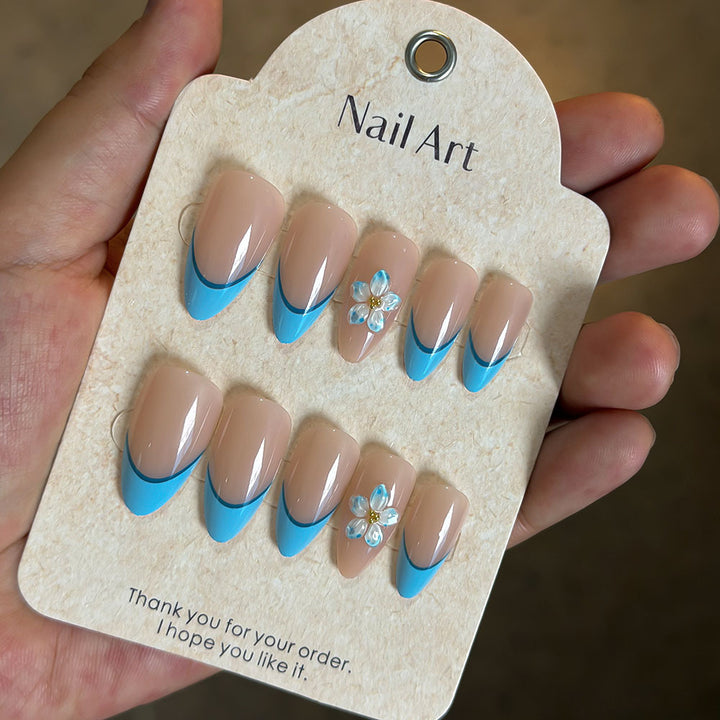 Artistic Press-On Nail Kit with Floral Accents Bowlift