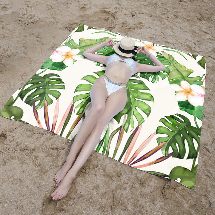 Beach blanket with vibrant floral pattern and innovative structure Bowlift