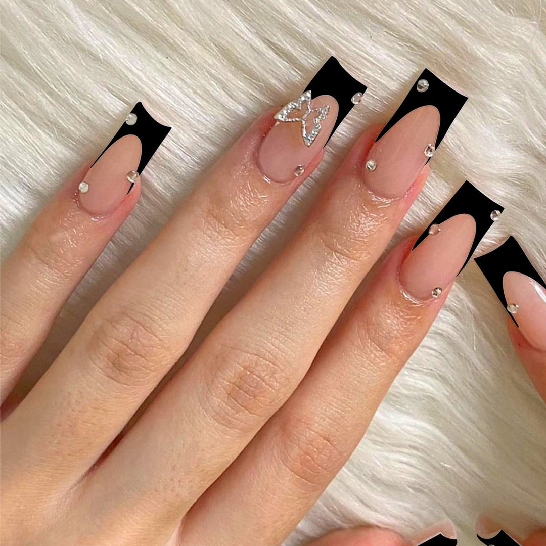 Acrylic nail set with elegant rhinestone details and modern designs Bowlift